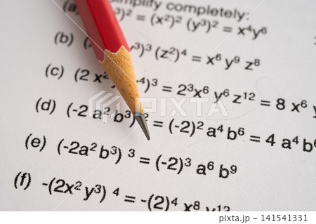Pencil on mathematic formula exercise test paper in education school. Pencil on mathematic formula exercise test paper in education school. 141541331