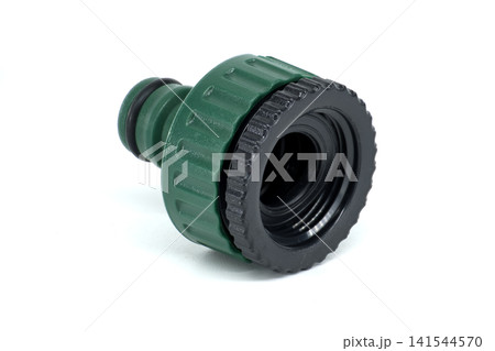 Green plastic garden hose connector with threaded female end for water supply Green plastic garden hose connector with threaded female end for water supply 141544570