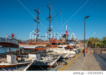 Wooden tourist boats moored at Marmaris embankment in Turkey Wooden tourist boats moored at Marmaris embankment in Turkey 141545041