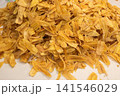 Close-up of shredded cooked chicken on white surface 141546029