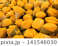 Close-up of sweet yellow jackfruit pieces on black background 141546030