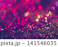 Colorful bokeh lights on dark background with festive glow 141546035