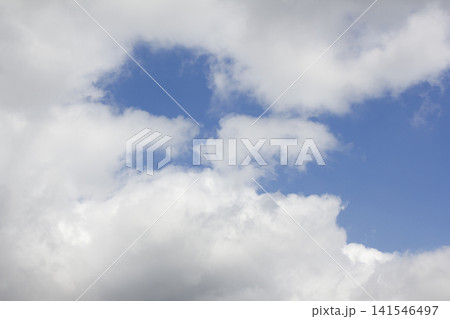 It is a blue sky with clouds. It is a blue sky with clouds. 141546497