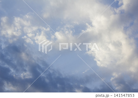 It is a cloudy late afternoon sky. 141547853