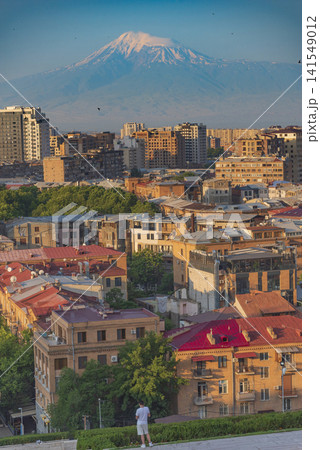 Vertical view of Yerevan and snow capped Mount Ararat at sunset with copy space 141549012