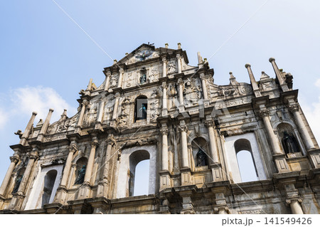 The ruins of St. Paul's Cathedral at Jesus Company Square in Macau, China, are a historic architectural landmark and a UNESCO World Heritage. 141549426