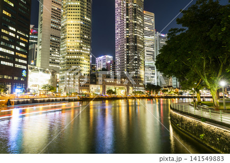 Night view of the Financial District skyscrapers along the Singapore River. Night view of the Financial District skyscrapers along the Singapore River. 141549883
