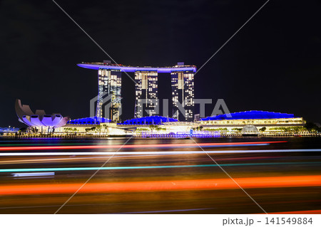 Night view of the Marina Bay Sands, an integrated resort fronting Marina Bay in Singapore, including a hotel, exhibition centre, Shopping mall, museum, casino, etc. 141549884