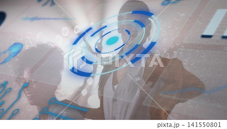 Presenting two women demonstrating holographic HUD at office, right woman wearing light blazer Presenting two women demonstrating holographic HUD at office, right woman wearing light blazer 141550801