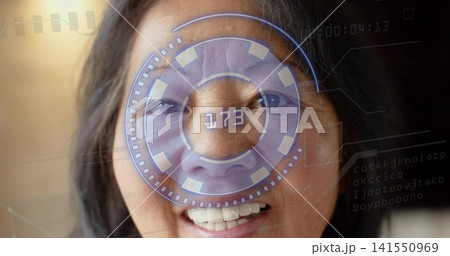 Smiling senior Chinese woman looking forward in studio close-up, with AR HUD showing 1 141550969