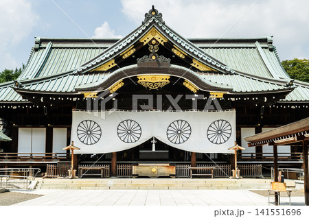 Building view of the Yasukuni Shrine, a Shinto shrine in Chiyoda, Tokyo, Japan. It was founded by Emperor Meiji in 1869 and commemorates those who died in the service of Japan. Building view of the Yasukuni Shrine, a Shinto shrine in Chiyoda, Tokyo, Japan. It was founded by Emperor Meiji in 1869 and commemorates those who died in the service of Japan. 141551696