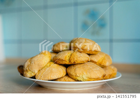 Plate of fresh homemade baked cookies on counter photo Plate of fresh homemade baked cookies on counter photo 141551795