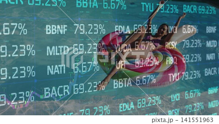 Reclining woman in darker top swimwear floating on donut ring in blue pool, with financial overlay Reclining woman in darker top swimwear floating on donut ring in blue pool, with financial overlay 141551963
