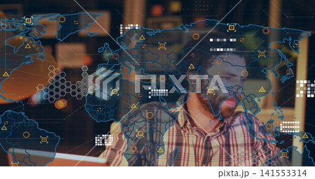 Analyzing man in plaid shirt studying computer screen at desk, with holographic map, copy space Analyzing man in plaid shirt studying computer screen at desk, with holographic map, copy space 141553314