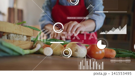 Chopping red-aproned woman slicing green onions and turnips on wooden counter, wooden crate and HUD Chopping red-aproned woman slicing green onions and turnips on wooden counter, wooden crate and HUD 141553495