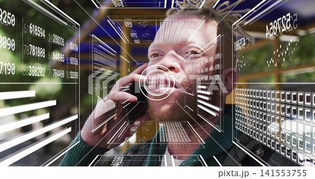 Holding phone, adult man with dark jacket over green sweater, viewing augmented data panels at park Holding phone, adult man with dark jacket over green sweater, viewing augmented data panels at park 141553755