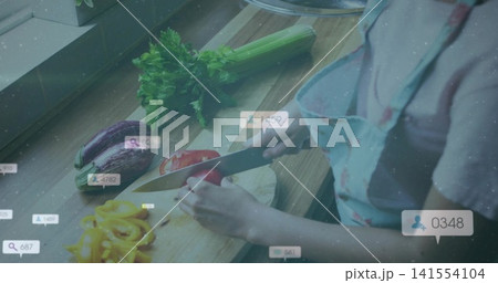 Slicing cook patterned-apron cutting red pepper at home counter, chef knife, UI bubbles, copy space Slicing cook patterned-apron cutting red pepper at home counter, chef knife, UI bubbles, copy space 141554104