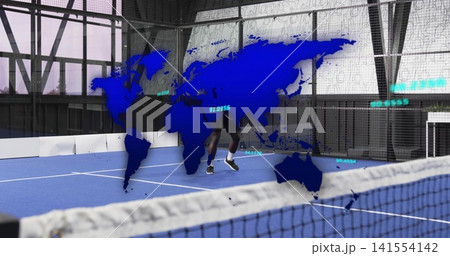 Running athlete sprinting on blue court in black shorts, white shoes, with net, world-map overlay 141554142