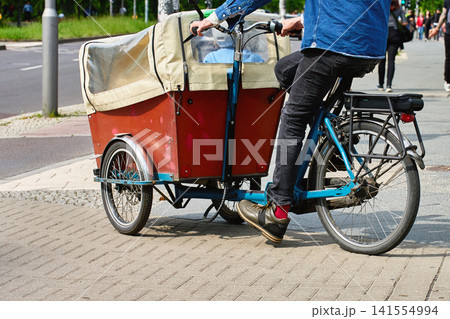 Electric cargo bike for urban transportation Electric cargo bike for urban transportation 141554994
