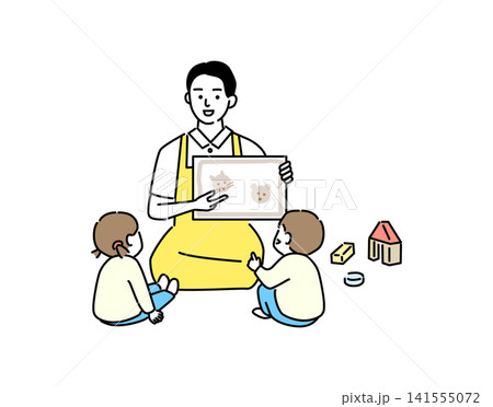 子供に絵を見せる若い保育士の男性 子供に絵を見せる若い保育士の男性 141555072