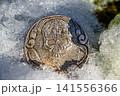 Coin with a skull lying on the snow, souvenir coin in the style of Hobo Nickel 141556366