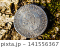 Souvenir coin of five pesos in the style of Hobo Nickel with the image of a skull in place of the portrait of the Aztec ruler Cuauhtemoc 141556367