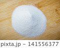 Aluminum oxide or electrocorundum - a pile of white abrasive powder with a grain size of 250 micrometers, formula Al2O3 141556377