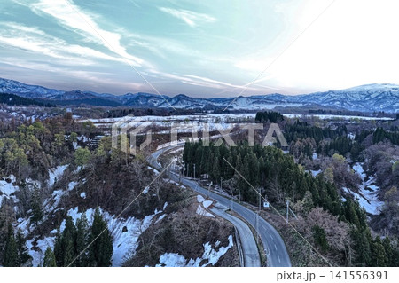 山形県大蔵村の山間部と残雪を捉えた空撮写真 山形県大蔵村の山間部と残雪を捉えた空撮写真 141556391