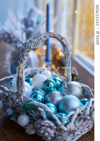 Christmas Baubles in a Woven Basket 141557609