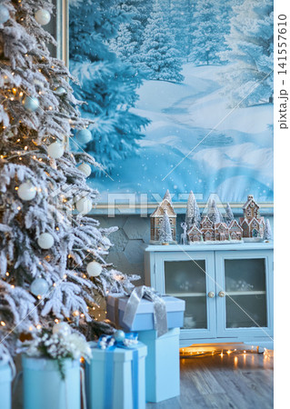 Frosted Christmas Tree, Miniature Village, and Winter Mural Backdrop Frosted Christmas Tree, Miniature Village, and Winter Mural Backdrop 141557610