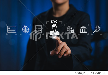 Know Your Customer KYC Digital Identity Verification Concept. Person touches virtual KYC with icon biometric, ID, document, procedures, identity verification, and secure compliance processes. Know Your Customer KYC Digital Identity Verification Concept. Person touches virtual KYC with icon biometric, ID, document, procedures, identity verification, and secure compliance processes. 141558565