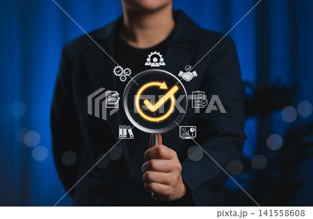 Quality Assurance and Certification Compliance Concept. A magnifying glass with checkmark surrounded by business icon, symbolizing quality assurance, compliance, and certification. certified document, 141558608