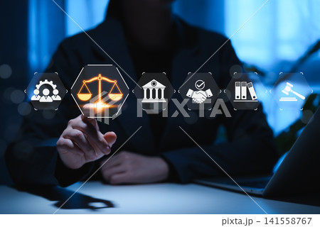 Law and Justice Concept. A suited legal professional touches virtual icons symbolizing law, justice, legal services. lawyer, business legislation, notary public, online legal advice, practice of law, Law and Justice Concept. A suited legal professional touches virtual icons symbolizing law, justice, legal services. lawyer, business legislation, notary public, online legal advice, practice of law, 141558767