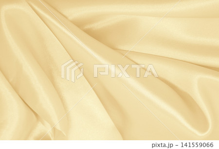 Smooth elegant golden silk or satin luxury cloth texture as wedding background. Luxurious background design. In Sepia toned. Retro style Smooth elegant golden silk or satin luxury cloth texture as wedding background. Luxurious background design. In Sepia toned. Retro style 141559066