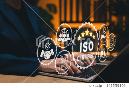 ISO Certification and quality management concept. Businesswoman using laptop with ISO certified and quality assurance icon, international standards, compliance, quality management systems, certificate ISO Certification and quality management concept. Businesswoman using laptop with ISO certified and quality assurance icon, international standards, compliance, quality management systems, certificate 141559102