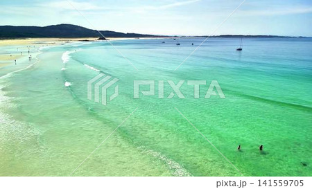Breathtaking Scenic Beach Landscape Featuring Clear Blue Waters and Soft Sandy Shores 141559705