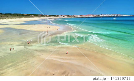 Explore a breathtakingly Scenic Beach View featuring Golden Sand and Clear Water that captivates 141559712