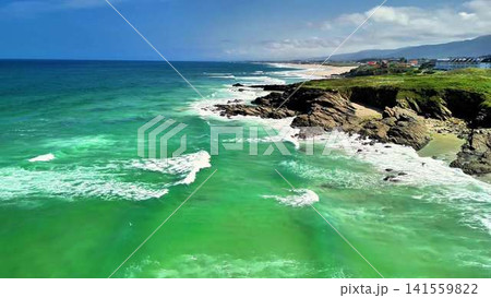 A Breathtaking Coastal View Featuring Stunning Turquoise Waters and Dramatic Cliffs A Breathtaking Coastal View Featuring Stunning Turquoise Waters and Dramatic Cliffs 141559822