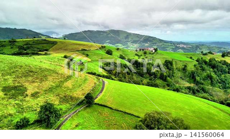 Lush Green Hills and Scenic Landscapes Ideal for Relaxation and Outdoor Exploration Lush Green Hills and Scenic Landscapes Ideal for Relaxation and Outdoor Exploration 141560064