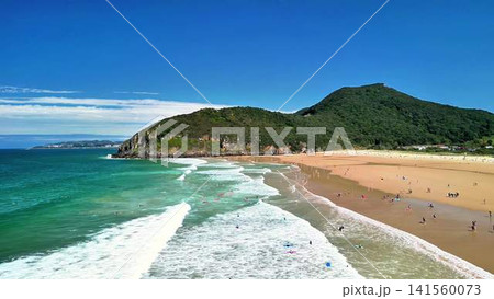 Stunning Aerial View of a Beautiful Beach with Crystal Clear Waters and White Sands Stunning Aerial View of a Beautiful Beach with Crystal Clear Waters and White Sands 141560073