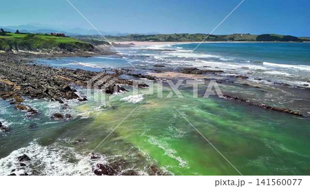 Explore breathtaking coastal views with a rocky shoreline and turquoise waters for relaxation Explore breathtaking coastal views with a rocky shoreline and turquoise waters for relaxation 141560077