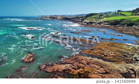 Stunning and Beautiful Coastal Landscape Showcasing Clear Waters and a Rocky Shoreline Stunning and Beautiful Coastal Landscape Showcasing Clear Waters and a Rocky Shoreline 141560099