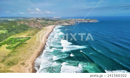 Stunning Aerial View of the Serene Beach and the Ocean Waves, Capturing Natures Beauty Stunning Aerial View of the Serene Beach and the Ocean Waves, Capturing Natures Beauty 141560102