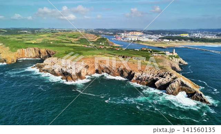 Stunning Aerial View of a Beautiful Coastal Landscape Featuring Waves and Majestic Cliffs Stunning Aerial View of a Beautiful Coastal Landscape Featuring Waves and Majestic Cliffs 141560135