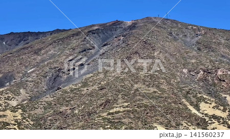 The stunning mountain landscape showcases diverse terrain and lush greenery in all directions 141560237