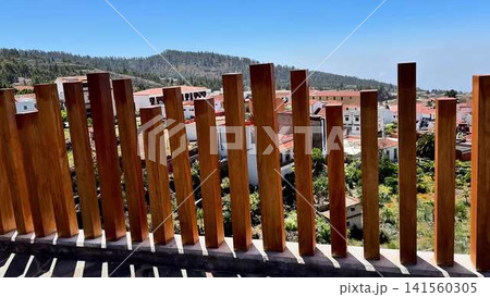 Breathtaking Scenic View from a Beautiful Wooden Deck Overlooking the Surrounding Landscape Breathtaking Scenic View from a Beautiful Wooden Deck Overlooking the Surrounding Landscape 141560305