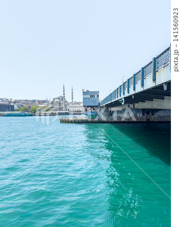 Vibrant city harbor, Maritime scene featuring traditional and contemporary structures Vibrant city harbor, Maritime scene featuring traditional and contemporary structures 141560923