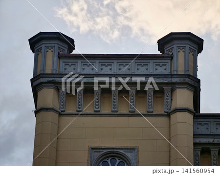 Decorative stonework with symmetry. Neoclassical design featuring ornate detailing and stone features 141560954