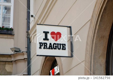 I heart Prague street sign mounted on beige wall for tourism souvenir background and travel banner design I heart Prague street sign mounted on beige wall for tourism souvenir background and travel banner design 141562750