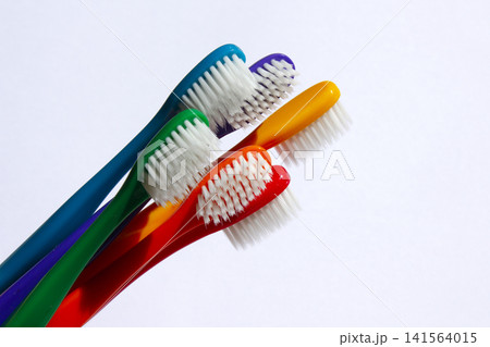 This is a collection of colorful toothbrushes. This is a collection of colorful toothbrushes. 141564015